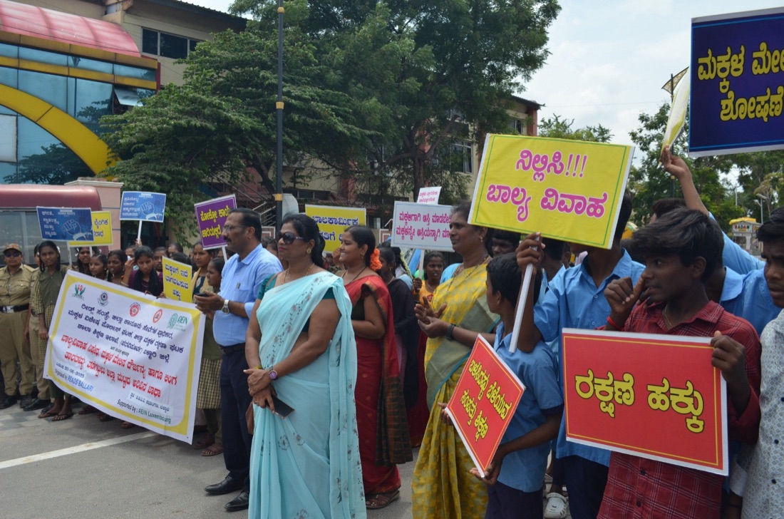 Students marching against child marriage